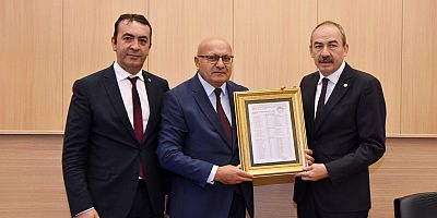 KTO BAŞKANI GÜLSOY MAZBATASINI ALDI