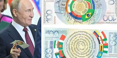 Putin’e sembolik BRICS parası verildi